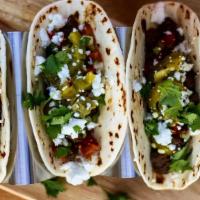 Tasty Street Tacos -3  · Specially Seasoned Wygu Beef,  jalapenos , Pico De Gallo, Fresh Guacamole