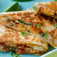 Chicken Quesadilla · Large Flour tortilla filled with Colby jack cheese your choice of shredded chicken or beef. ...