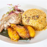 El Guavate · Pernil / Puerto Rican style pork roast served with two sides.