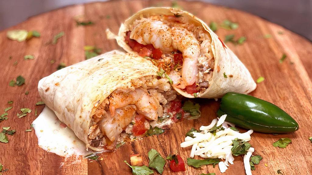 Shrimp Burrito · Our delicious Mexican shrimp burrito recipe is in town! Tortilla filled with grilled shrimps and topped with Mexican rice, refried beans, and pico de gallo.