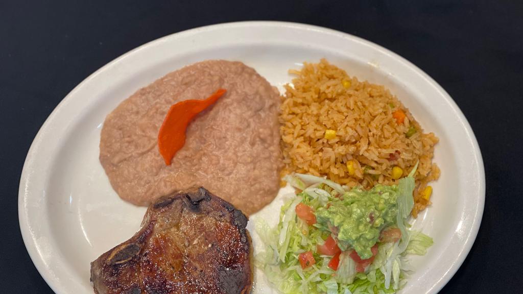 Pork Chops Plate  · Served with: rice, beans, guacamole salad, pico de gallo and two tortillas