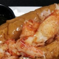 Hot Buttered Lobster Roll · Over 1/4 lb Hot buttered lobster on buttered roll with Fries