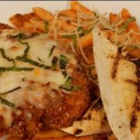 Chicken Parmesan · Fresh chicken breast hand breaded in seasoned bread crumbs, fried to a golden brown topped w...