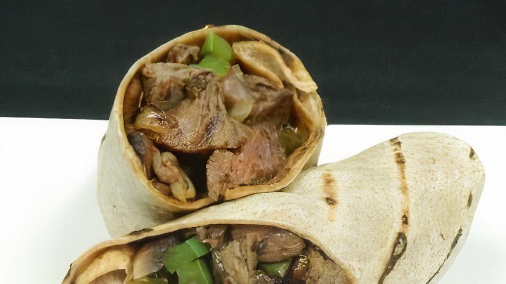 Black'S Cajun Steak Wrap · Tender chunks of rib eye dusted with cajun spices, mixed with onions, mushrooms & peppers. topped with cheddar jack cheese then toasted in a pressed wrap.