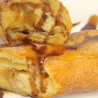 Banana Cheesecake Xango · Sweet creamy cheesecake with layered with chunks of banana in a flour tortilla deep fried to...