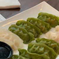 Steamed Vegetable Gyoza (8 Pcs) · 8 Dumplings.