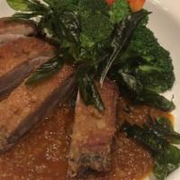 Duck Kra Prow · **This item cannot be made Gluten-free**. Deep-fried battered duck breast, steamed broccoli ...