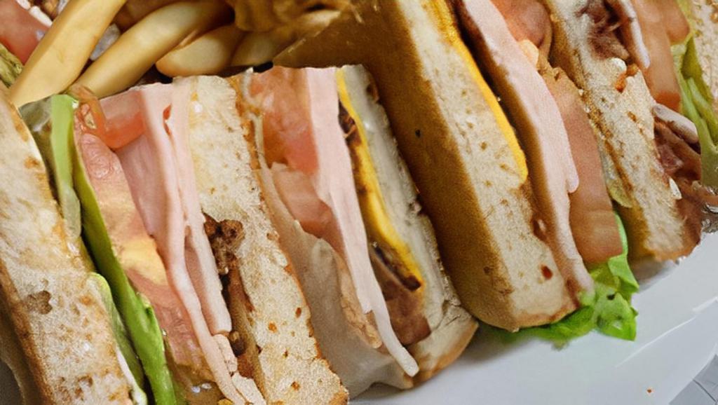 The Ultimate Club · Triple decker piled high with crispy bacon, turkey, lettuce, tomato, American and Mozzarella cheese and mayo. served on your choice of bread.