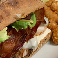 Chicken Bacon Avocado Sandwich · Grilled chicken breast topped with crispy bacon, sliced avocado, Mozzarella cheese and your ...