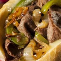 Philly Cheesesteak · Thinly sliced Sirloin Steak topped with sautéed with melted American and PepperJack cheese