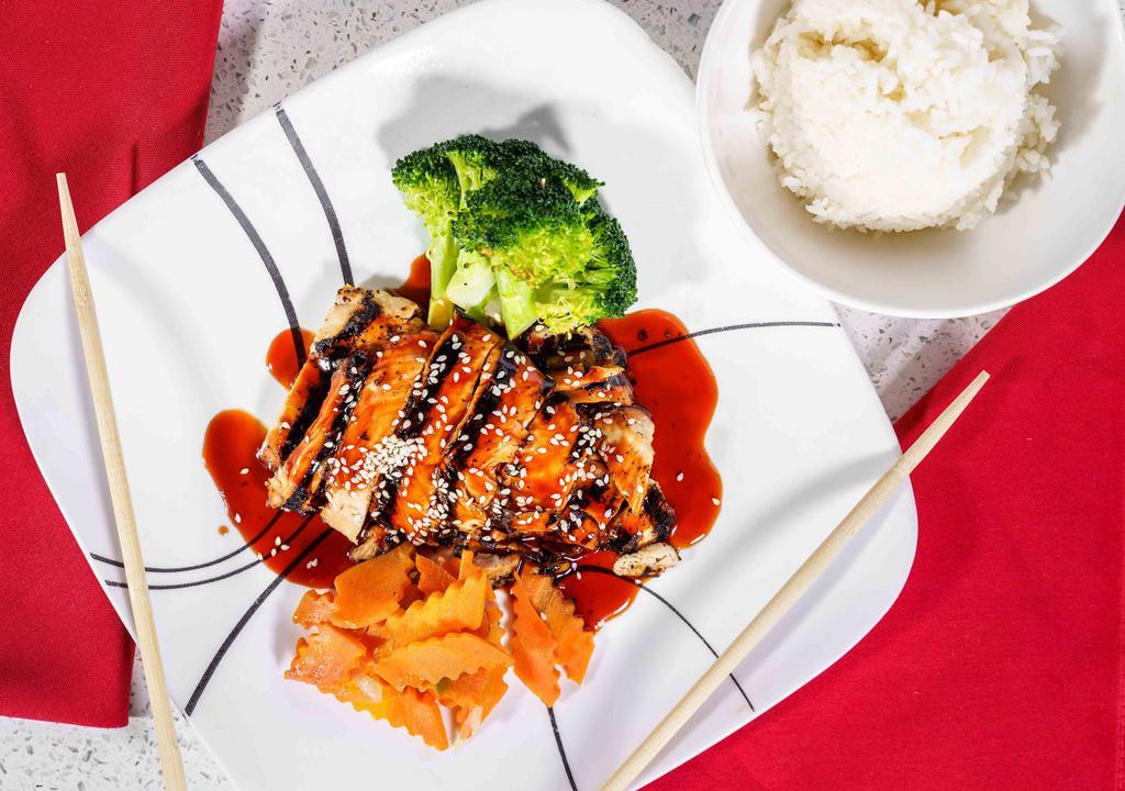 Grilled Teriyaki Chicken With Steamed Vegetables · Grilled chicken breast with steamed broccoli and green bean in sweet teriyaki sauce.