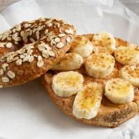 Cashew Spread With Banana New · Healthy cashew butter topped with fresh sliced bananas.