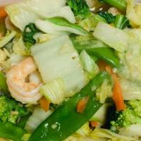Rau Cai Xao (Tom) Hoac (Ga) · Stir-fried vegetables with chicken or shrimp. served w. a small white rice