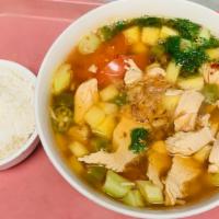 Canh Chua Ca, Tom Hoac Ga · Sour soup with salmon or shrimp or chicken, bean sprout, celery, pineapples, tomatoes and he...