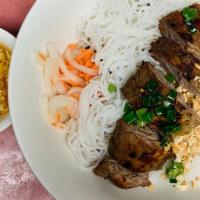 Bun Vit Nuong Chao (Com) · Grilled duck with Vermicelli Noodle or Rice. Served w Ginger sauce
