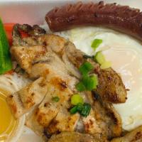 Com Suon Lap Xuong Op La · Grilled pork chop, Chinese sausage and fried egg.