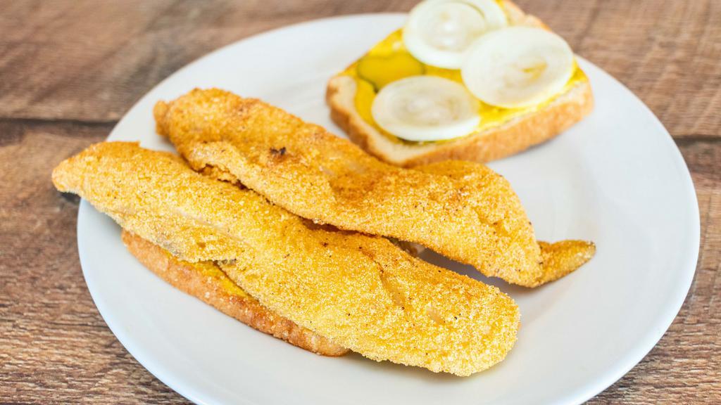 Fish Sandwich · Two lightly breaded pieces of whiting fish fillets, mustard, hot sauce, onions and pickles on white bread.
