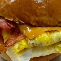 Brioche Breakfast Sandwich. · Cheddar, Bacon, Egg, And More Cheddar On Brioche