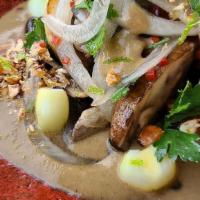 Vegano · Cauliflower, pickled mushrooms, vegan leche de tigre, cancha corn, sweet potato, chocio.
