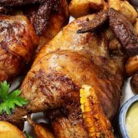 Half Chicken · Peruvian - style rotisserie organic chicken served with fried rustic potatoes, spring salad ...