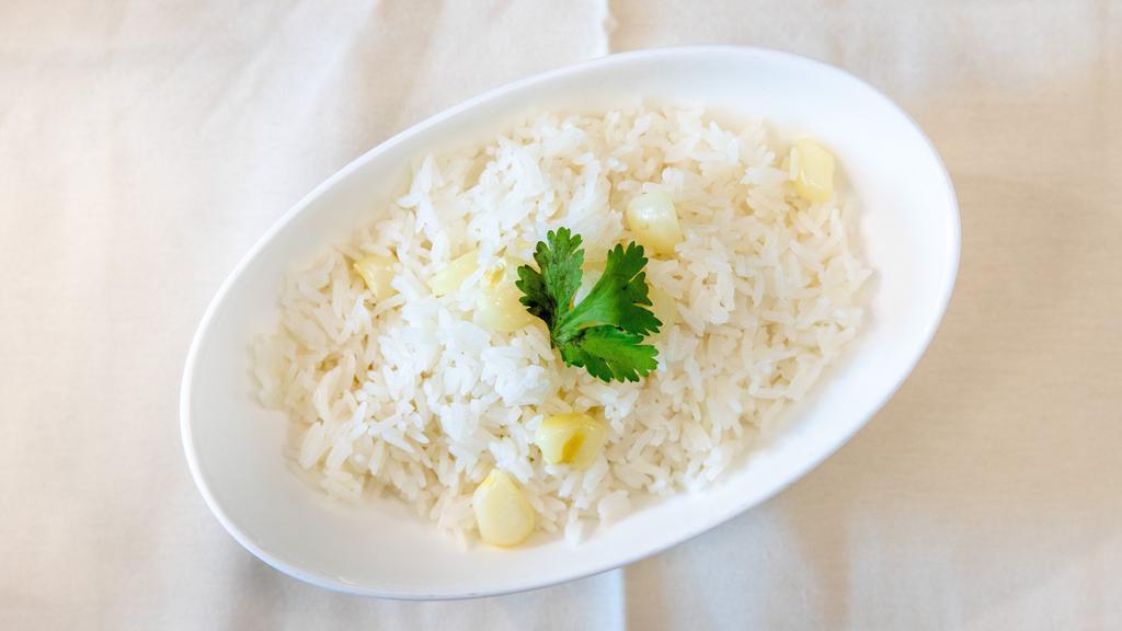 Jasmine Rice · Garlic infused Jasmine rice , giant corn