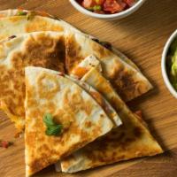 Squash Blossom Quesadilla · Soft, foot long flour tortilla filled with delicate, sautéed squash blossoms and tons of str...