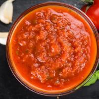 Salsa Verde/Red Sauce · Housemade red chile salsa.