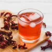 Jamaica Hibiscus Drink · Sweet, cold, red Hibiscus tea.