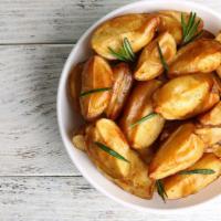 Seasoned Potato Wedges · Golden and crispy potato wedges that are extra crunchy and seasoned to perfection.