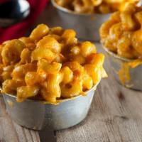 Oven-Baked Crispy Mac & Cheese · This classic macaroni and cheese recipe featuring a special blend of cheeses including Parme...