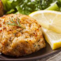 Wild Caught Grilled Crab Cake Platter · Golden and grilled crab cakes, with 2 pieces of crab cake, served on a bed of baby arugula, ...