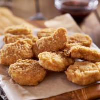 Chicken Nuggets · Golden and crispy chicken meat that is breaded or battered, then deep-fried.