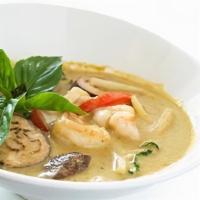 Green Curry · Bamboo shoots, eggplant and basil leaves in green chili coconut curry.