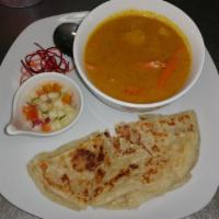 Roti K/K (Chicken) · Thai grilled roti with Thai yellow curry coconut milk, chicken kg meat, potatoes, carrots, a...