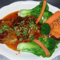 Samrod (3-Flavored Sauce) · Spicy. Crispy duck with samrod sauce, served with bok choy vegetables.