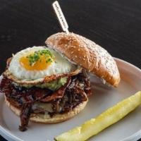 The Hangover · Grass-Fed Dry Aged Beef + House Brioche Bun + Aged White Cheddar + Caramelized Onions + Cand...