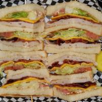 Club Sandwich (Turkey, Ham Or Roast Beef) · A Double Decker Sandwich on White or Wheat toast  or Marble Rye w/ Bacon, American cheese, L...