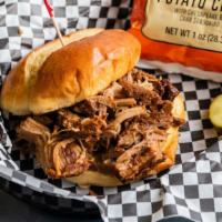 Pulled Pork Sandwich · Pulled Pork topped with Sweet Baby Ray's BBQ sauce or Kim's Caroline Style sauce. Usually se...