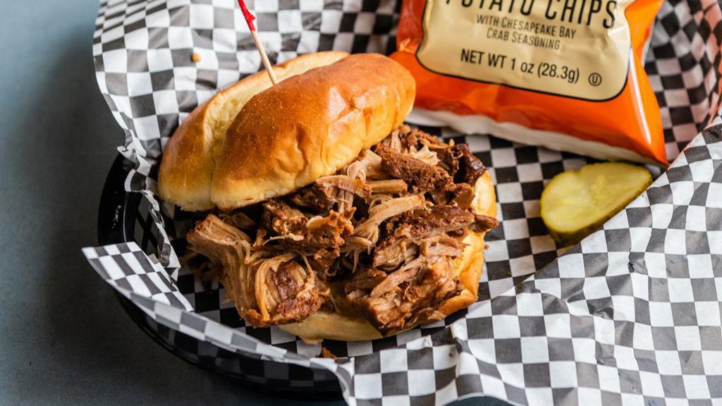 Pulled Pork Sandwich · Pulled Pork topped with Sweet Baby Ray's BBQ sauce or Kim's Caroline Style sauce. Usually served on Kaiser roll.