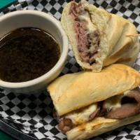 French Dip · Heated, Thin Sliced Roast Beef topped with Provolone Cheese on a toasted baguette sub roll. ...