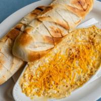 Crab Dip · A 1/2 lb of our in house recipe, served with 2 toasted baguette sub rolls or 2 Soft Pretzels...