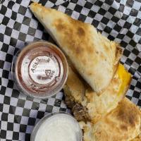 Pulled Pork Quesadilla · Pulled Pork, Cheddar & Pepper Jack cheese. served w/ sour cream & salsa on the side.