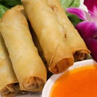 Egg Rolls · Deep fried mixed vegetable roll served with sweet and sour sauce.