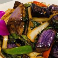 Spicy Eggplant · Eggplant stir fried with onion, bell pepper, and basil.