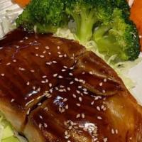 Salmon Teriyaki · Grilled salmon with steamed mixed vegetable and teriyaki sauce.