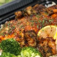 Salmon Meal · Honey Glazed Salmon on a bed of rice w/ broccoli