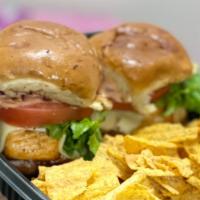 Salmon Sliders · Two Salmon Sliders W/ Choice of Chips