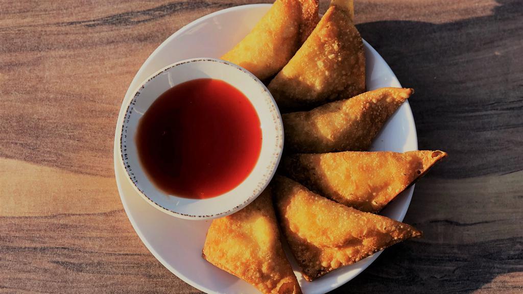 6 Cheese Rangoons · Deep fried wontons stuffed with Cream Cheese, a pinch of green onion, & toasted sesame seeds.