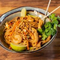 Pad Thai · Rice noodle dish made with House Pad Thai sauce, topped with Peanuts, served with Lime and C...