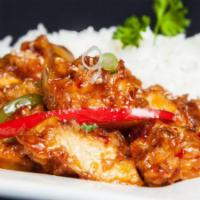 Sesame Chicken · Fried chicken tossed in a sesame sauce topped with scallions bell peppers and sesame seeds. ...